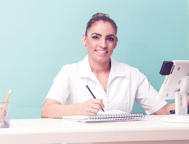 Massage therapists managing Planfy booking system.