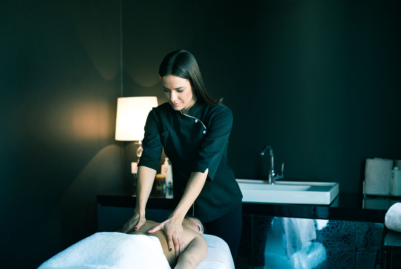 Massage therapist li jipprovdi servizz li ġie rreġistrat bl-użu tal-app Planfy.